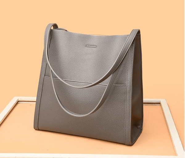 Bolso de hombro liso y unicolor de cuero genuino