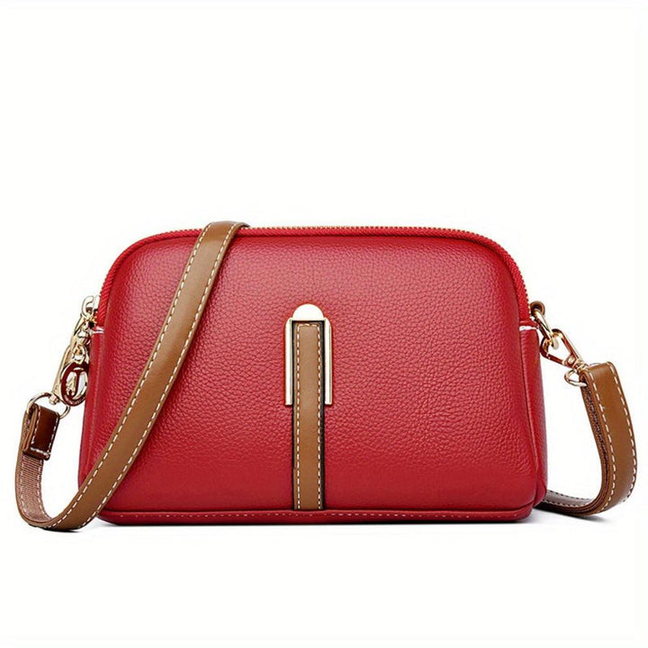 Bolso bandolera Mila con patrón de grabado