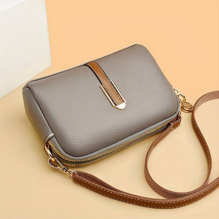 Bolso bandolera Mila con patrón de grabado